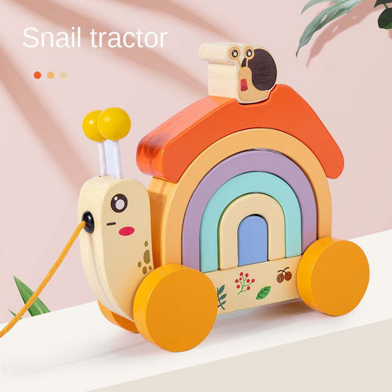 Offrez à votre enfant un jouet éducatif et amusant avec notre tracteur escargot en bois. Stimule la créativité et l'apprentissage des couleurs. Idéal dès 3 ans !